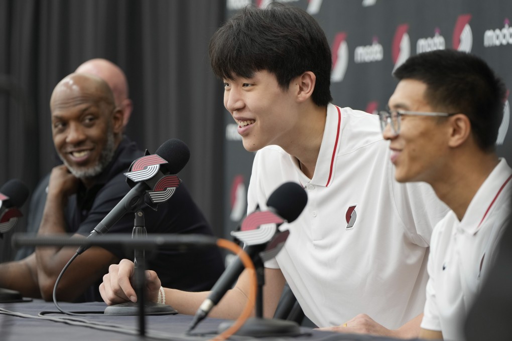 Portland Trail Blazers’ Yang Hansen responds to a question as Portland Trail Blazers head coach Chauncey Billups (left) looks on during a news conference on Friday. Photo: AP