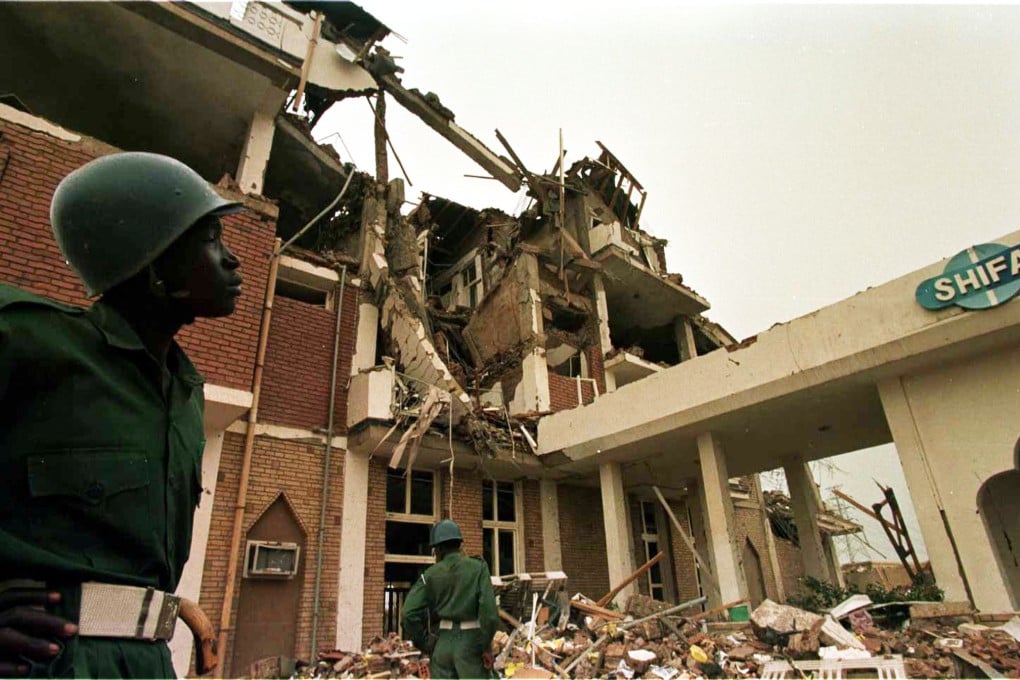 Sudanese soldiers look at the wreckage of a pharmaceutical factory in the outkirts of Khartoum on August 25, 1998 that was hit by US missiles, following US claims it produced precursors to chemical weapons. Photo: AP