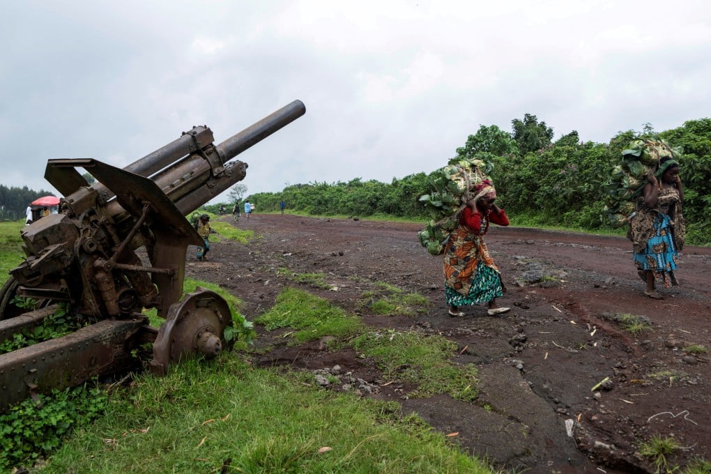 Esperance Zawadi and her colleague carry fresh cabbages to the market in April months after their return from the Kanyaruchinya camp where they took refuge following clashes between the M23 rebels and the Congolese army in Kibumba, Nyiragongo territory of North Kivu province in eastern Democratic Republic of Congo. Photo: Reuters