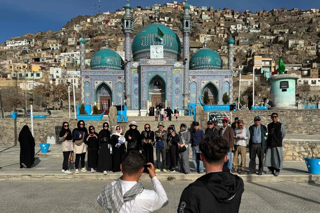 In this picture taken on March 25, 2024, Thai tourists pose for a group picture during their visit to the Kart-e-Sakhi Shrine in Kabul, Afghanistan. Photo: AFP