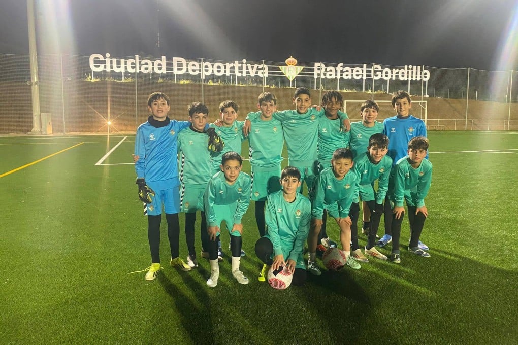Johnny So (front row, centre) at training with Real Betis’ academy. Photo: Handout