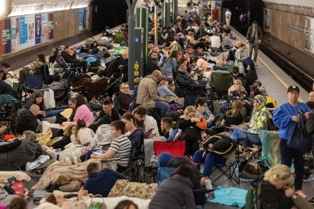 People take shelter inside a metro station in Kyiv, Ukraine. Photo: Reuters