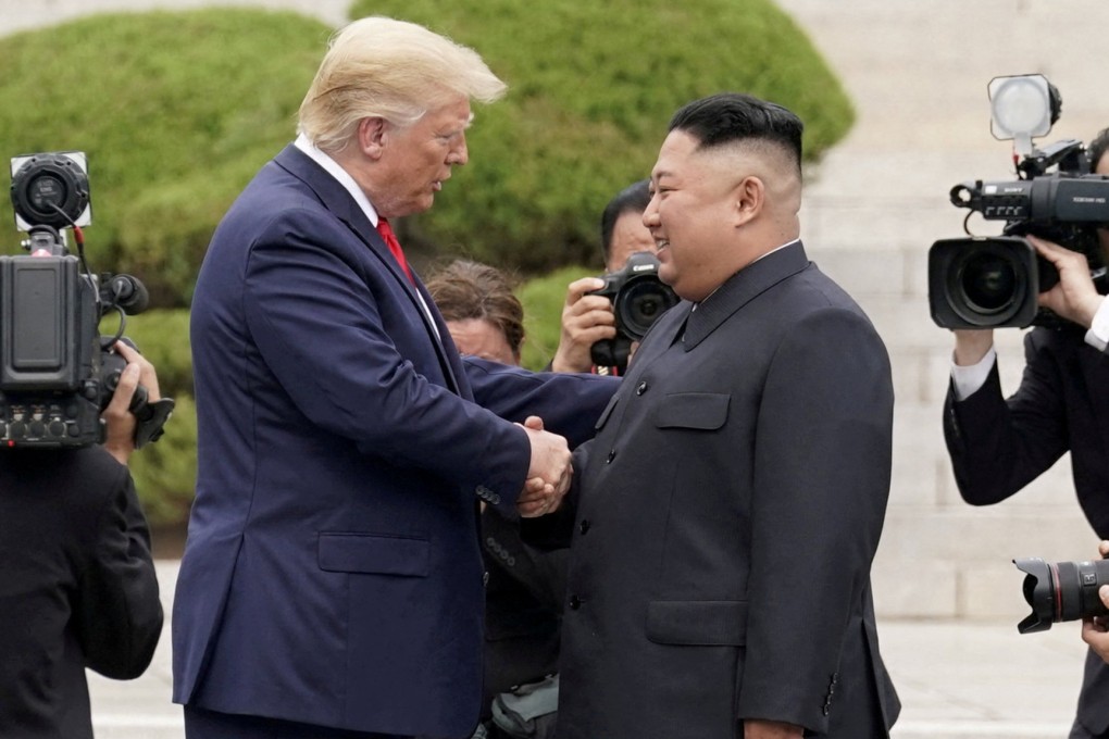US President Donald Trump shakes hand with North Korean leader Kim Jong-un at the demilitarised zone separating the two Koreas during their third and final meeting in 2019. Photo: Reuters