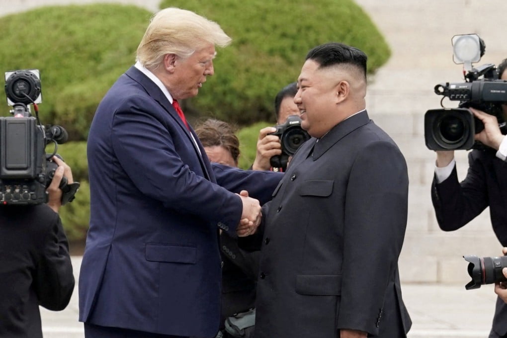 US President Donald Trump shakes hand with North Korean leader Kim Jong-un at the demilitarised zone separating the two Koreas during their third and final meeting in 2019. Photo: Reuters