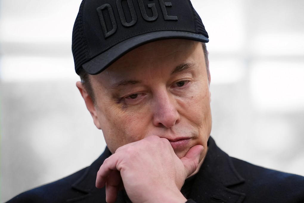 Elon Musk listens as US President Donald Trump speaks to reporters in the Oval Office on May 30. File photo: AFP