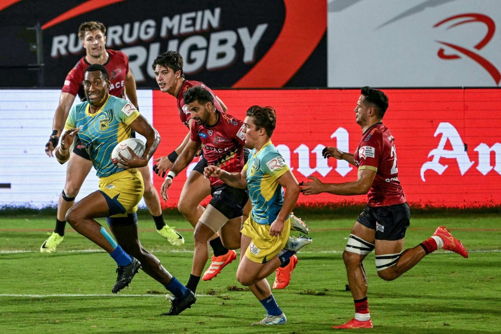 Michael Coverdale (right) and his Delhi Redz teammates on the chase for Chennai Bulls’ Fiji player Joseva Talacolo in the final of the Indian Rugby Premier League on Sunday. Photo: AFP
