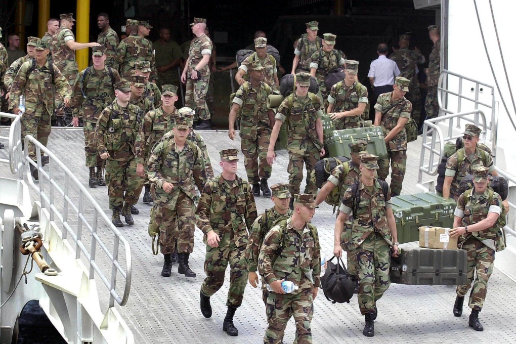 US troops disembark from a ship at the former American naval base in Subic Bay ahead of joint military exercises in 2002. Photo: AFP