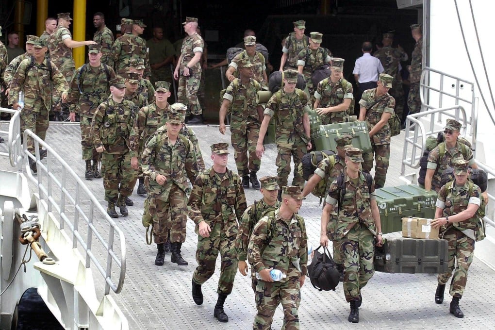US troops disembark from a ship at the former American naval base in Subic Bay ahead of joint military exercises in 2002. Photo: AFP