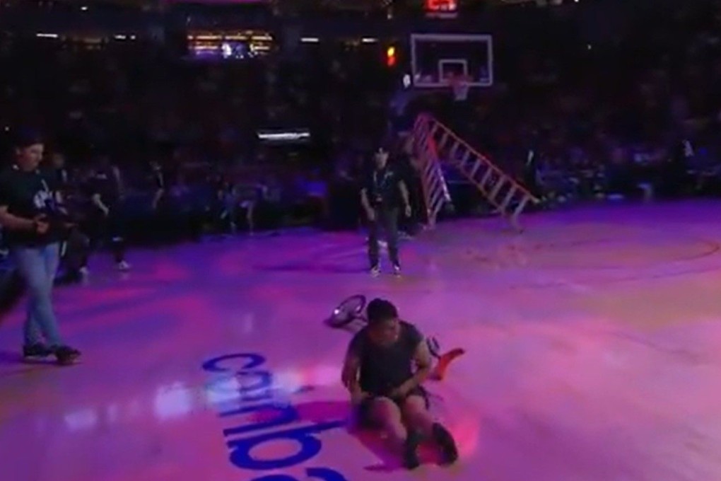 Popular NBA half-time performer Red Panda nurses an injured wrist after taking a fall during a WNBA performance. Photo: X/ @HoopyHoops