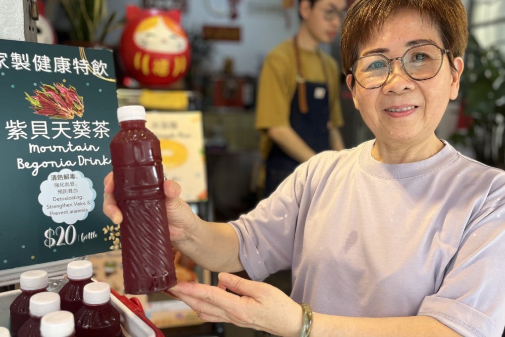Lily Wong holds a bottle of her homemade mountain begonia drink that she sells in Tai O, a historic fishing village in Hong Kong. Locals and a TCM expert share the benefits and risks of the ingredient. Photo: Kylie Knott
