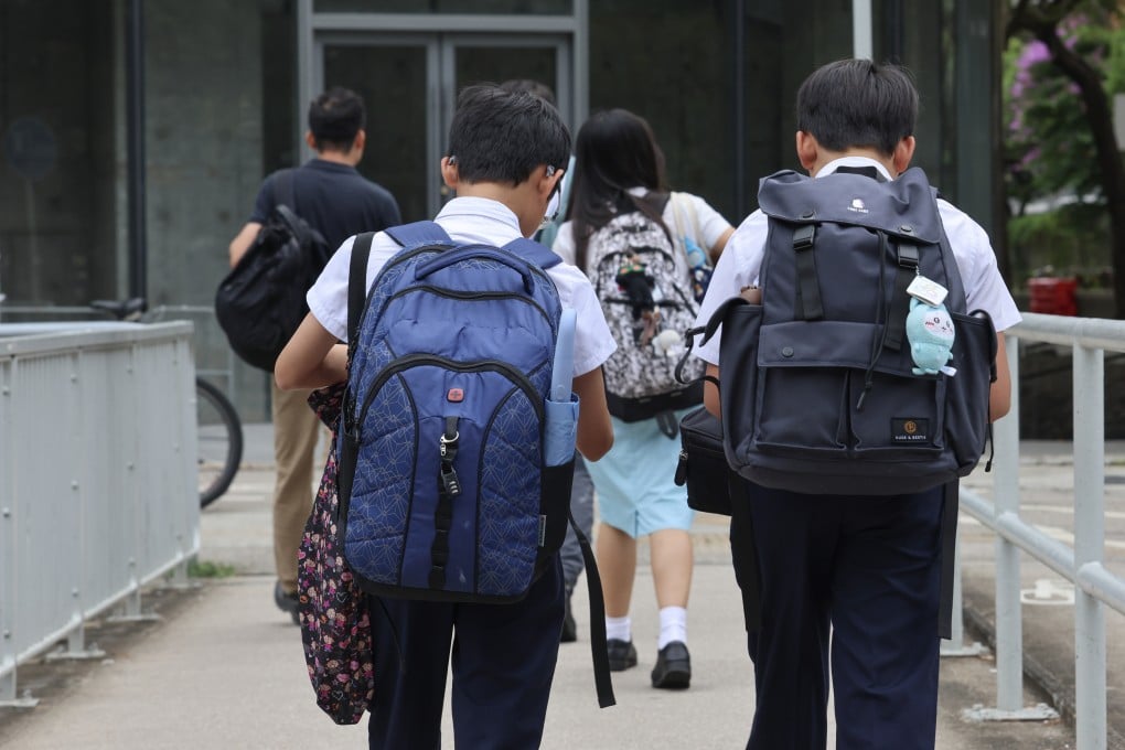 Secondary school students walk along a footpath in Fo Tan on June 6. Photo: Jelly Tse