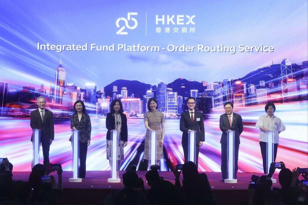(From left) Chen Mingzhong, executive president of Shenzhen Securities Communication; Tang Rui, executive vice-president of Shenzhen Stock Exchange; Salina Yan, Permanent Secretary for Financial Services and the Treasury (Financial Services); Bonnie Chan Yiting, CEO of HKEX; Trevor Lee, senior director for investment products at  Securities and Futures Commission; Richard Leung, group CIO at HKEX; and Glenda So, head of platform and market structure development at HKEX, at the launch ceremony of a new service on the Integrated Fund Platform at the HKEX Connect Hall on Thursday. Photo: Edmond So