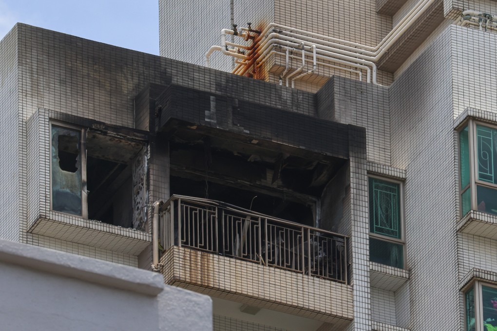 Police say firefighters did not find anyone when they first entered the flat, but later discovered the man dead on the balcony. Photo: Jelly Tse