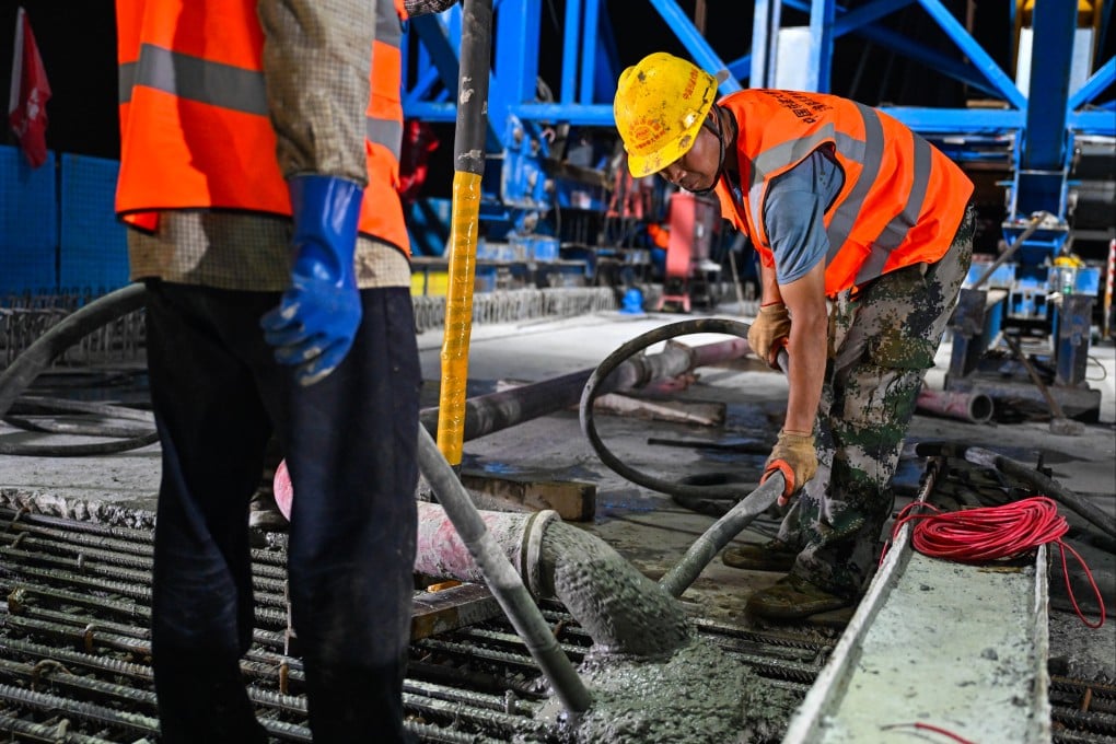 A construction crew works on a bridge in China’s Jiangsu province. Some large infrastructure projects have contributed to rising debt levels among local-level governments in the country. Photo: Xinhua