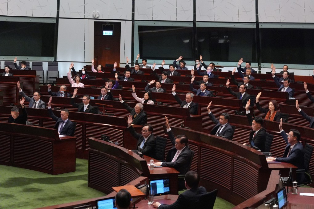 Show-of-hands voting before the third reading of the Basic Law’s Article 23 legislation at the Legislative Council in Hong Kong on the morning of March 19, 2024. Photo: Eugene Lee