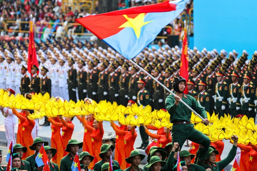 Vietnamese troop march during a parade in Ho Chi Minh city on April 30 to commemorate the 50th anniversary of the fall of Saigon. Photo: Reuters