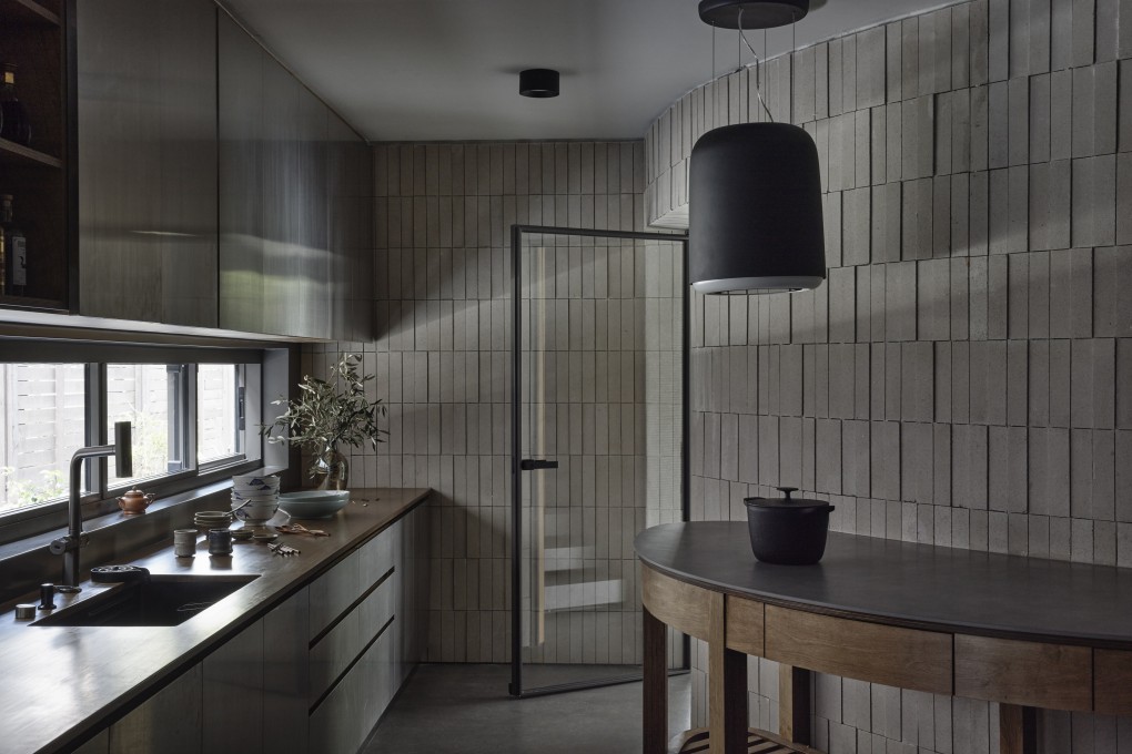 The kitchen on the ground floor of QR3D, Singapore’s first 3D-printed house, designed by architect/owner Lim Koon Park, founder and Principal of Park + Associates. Photo: Derek Swalwell