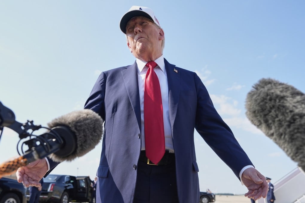 US President Donald Trump talks to reporters before boarding Air Force One at Joint Base Andrews, Maryland, on Thursday. Photo: AP