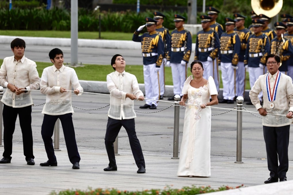 Philippine President Ferdinand Marcos Jnr (right) and his family lead Independence Day flag-raising and wreath-laying rites on June 12. The president is named after his late dictator father. Photo: EPA-EFE