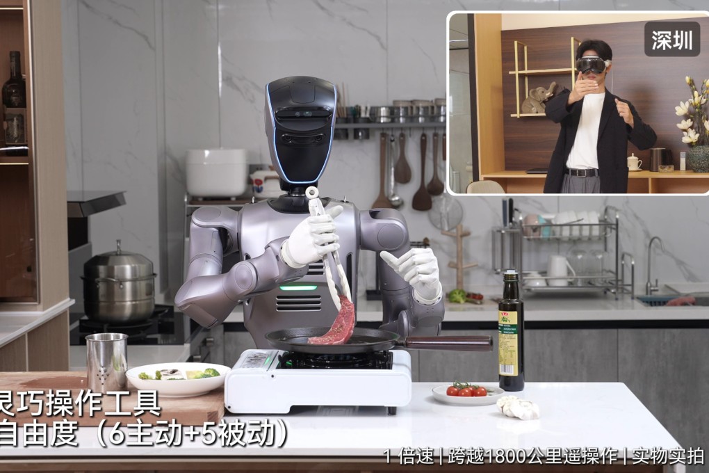 A man wearing a VR headset teleoperates a Shenzhen Dobot robot from 1,800km away. Photo: Handout