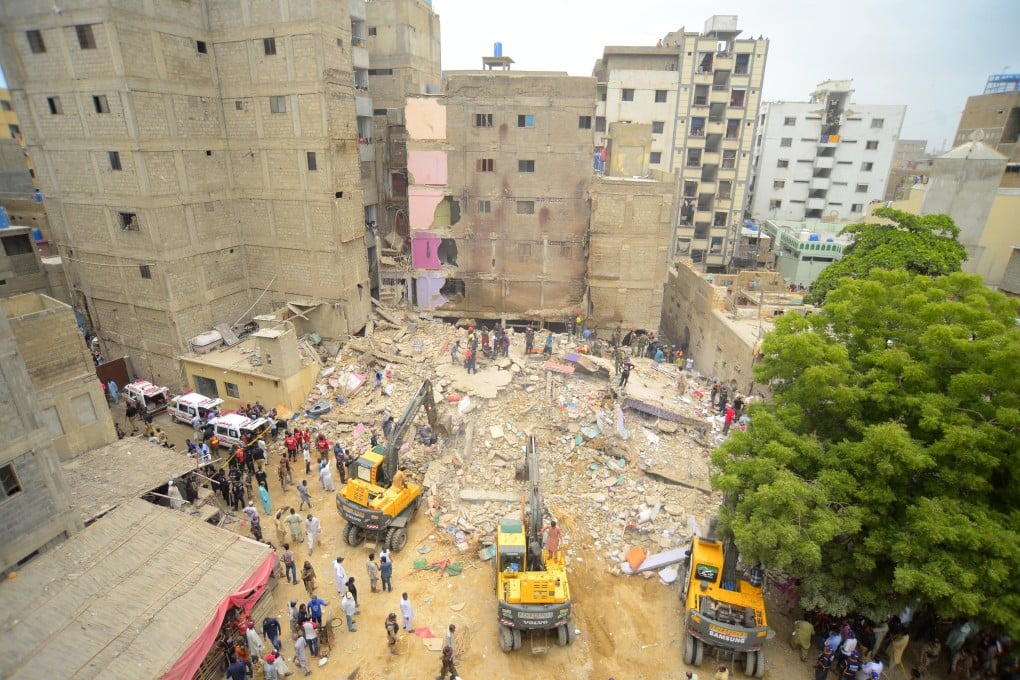 Rescuers work at the scene of a residential building collapse in Karachi, Pakistan, on Friday. Photo: Xinhua