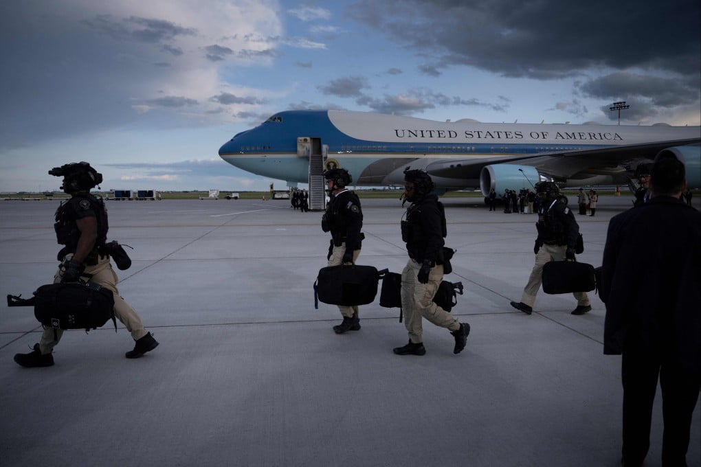 A Secret Service counter assault team arrives with US President Donald Trump at Calgary airport in Canada on June 15. Photo: AFP