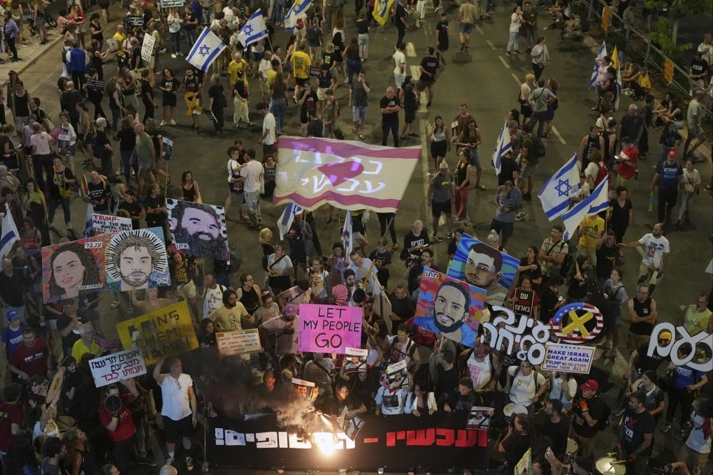 Protesters demand the end of the war and immediate release of hostages held by Hamas during a rally in Tel Aviv, Israel, on Saturday. Photo: AP