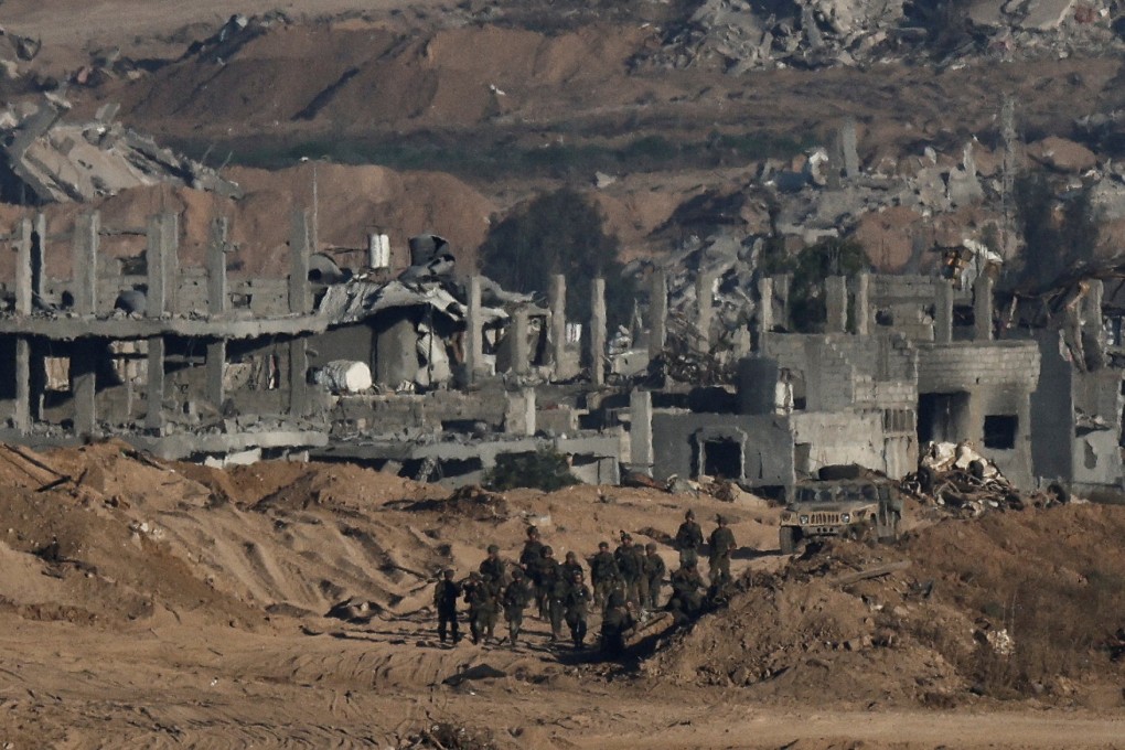 Israeli soldiers operating in Gaza, as seen from the Israeli side of the border. Photo: Reuters