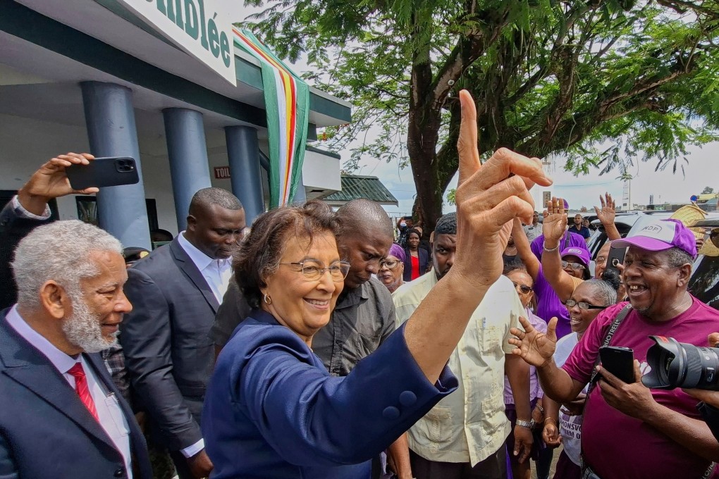 Jennifer Simons greeting people after the county’s parliament appointed her president. Photo: AP