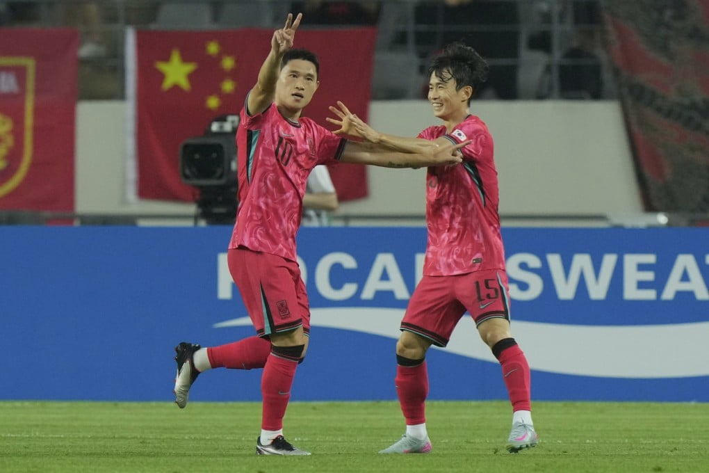South Korea’s Lee Dong-gyeong (left) celebrates with his teammate Kim Moon-hwan after scoring against China at Yongin Mireu Stadium. Photo: AP