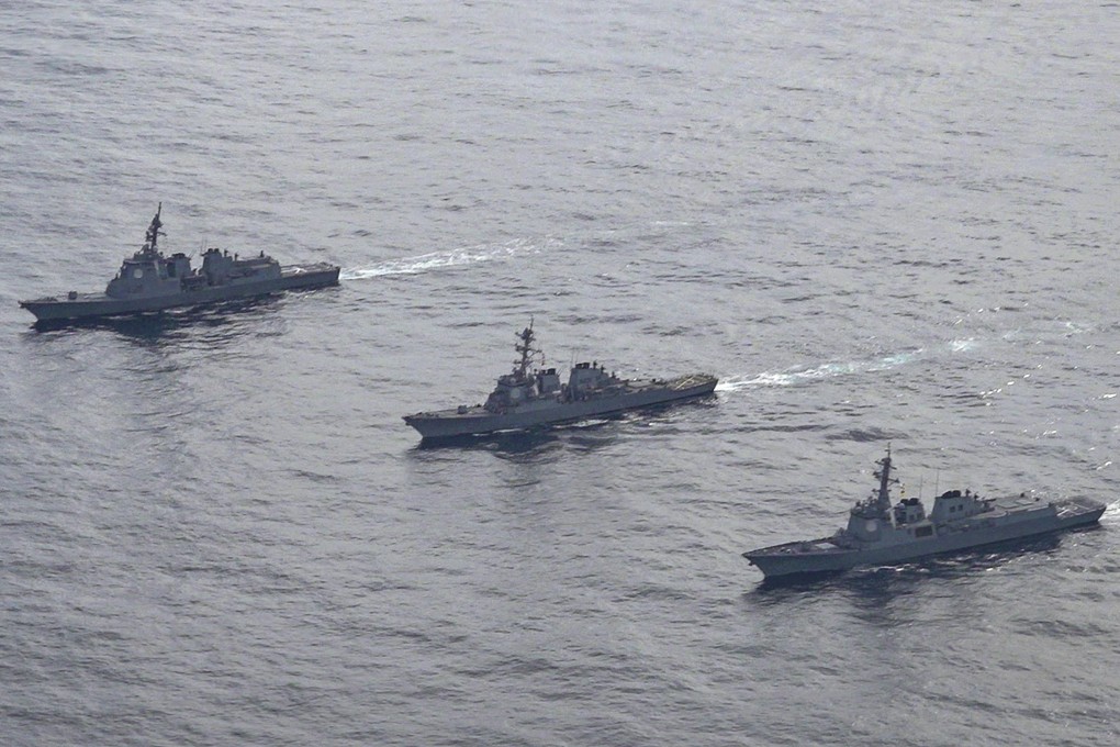Japan, South Korea and the US have looked to strengthen their military partnership in the face of growing threats from North Korea and China’s assertiveness. Pictured are (left to right) the Japan Maritime Self-Defense Force’s destroyer Atago, the US Navy’s Arleigh Burke-class guided-missile destroyer USS Barry and and the South Korean Navy’s Aegis destroyer King Sejong the Great. Photo: South Korea Defence Ministry