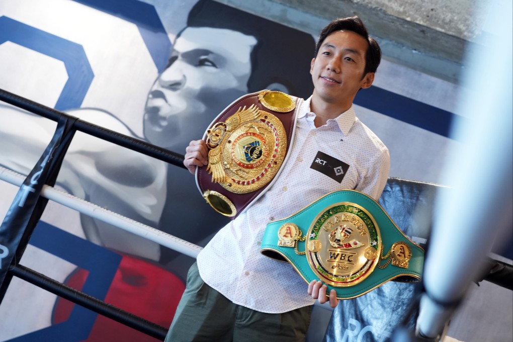 Rex Tso with two of the belts he held during his previous stint as a pro. Photo: Handout