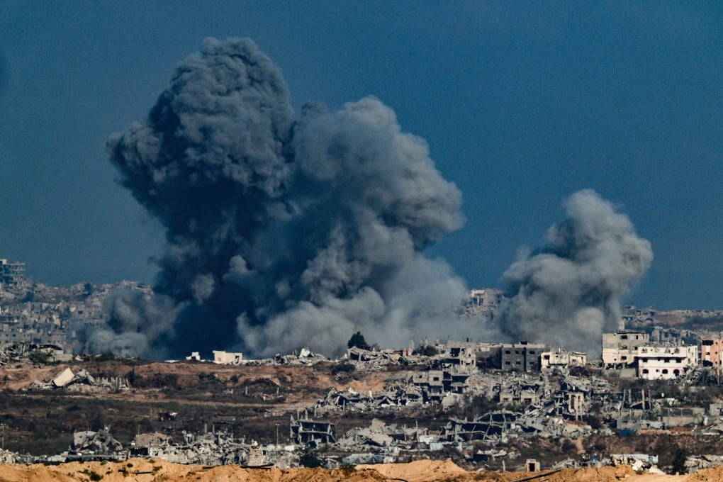 Smoke rises in Gaza after an explosion on Monday. A UN report says “far too many corporate entities have profited from the Israeli economy of illegal occupation, apartheid and now genocide”. Photo: Reuters