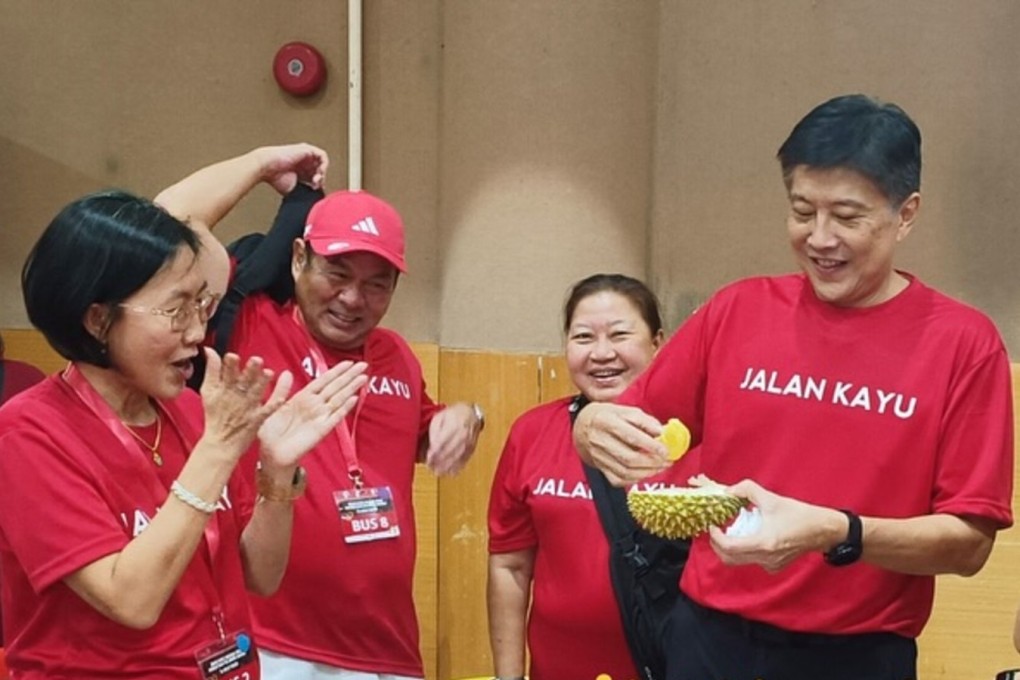 People’s Action Party MP Ng Chee Meng enjoys a durian-filled day trip to Johor with residents from his Jalan Kayu constituency. Photo: Instagram / ng.chee.meng