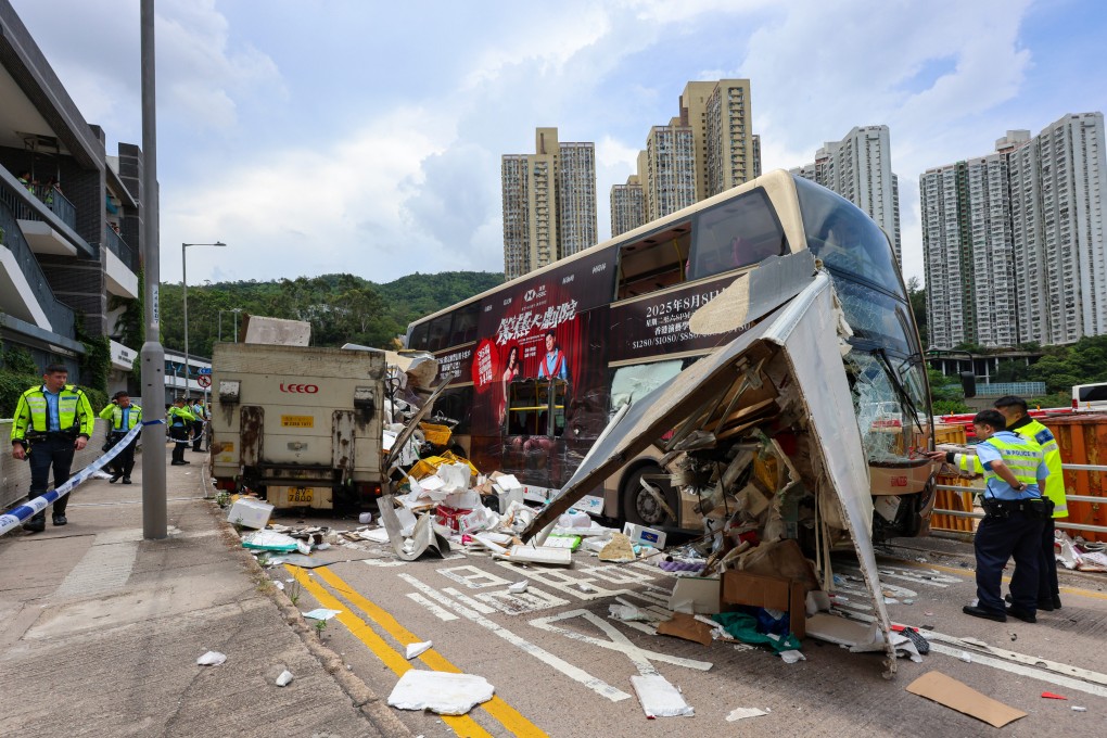 A collision between a bus and a truck on a road in a residential district left 12 people injured. Photo: Jelly Tse