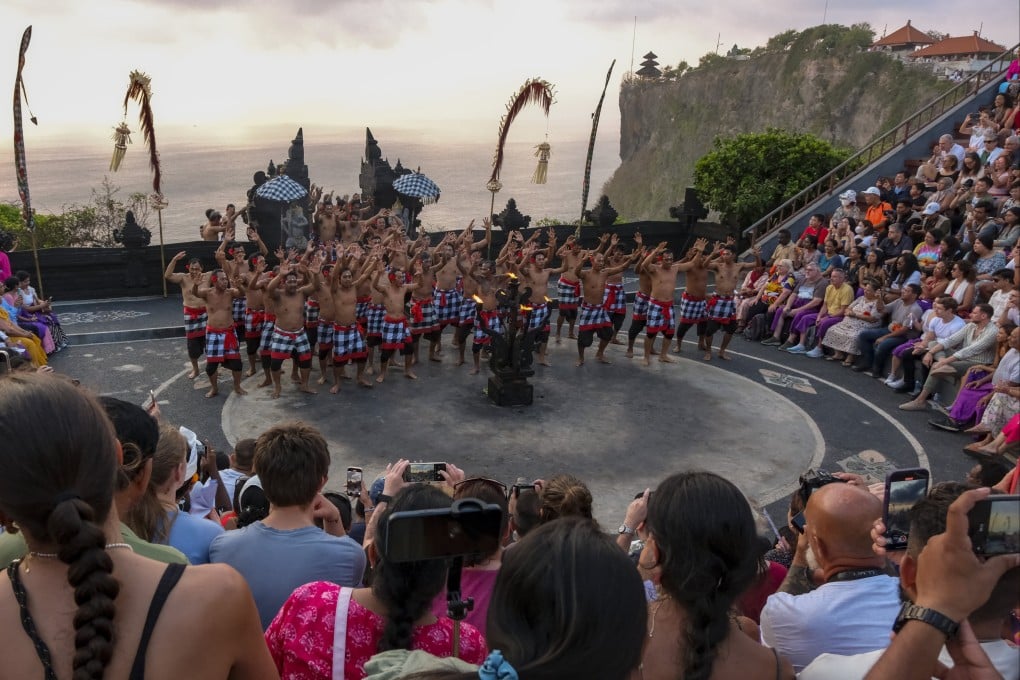 Visitors to Bali watching a Kecak dance performance. Photo: Anadolu via Getty Images