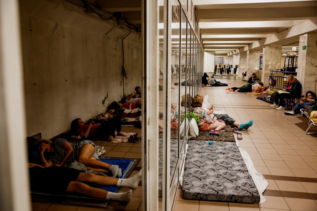 People take shelter inside a metro station in Kyiv, Ukraine. Photo: Reuters