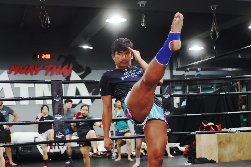ONE Championship flyweight kickboxing champion Superlek Kiatmoo9 demonstrates his skills during a seminar at Tai Po Sports Association Li Fook Lam Indoor Sports Centre. Photo: Edmond So