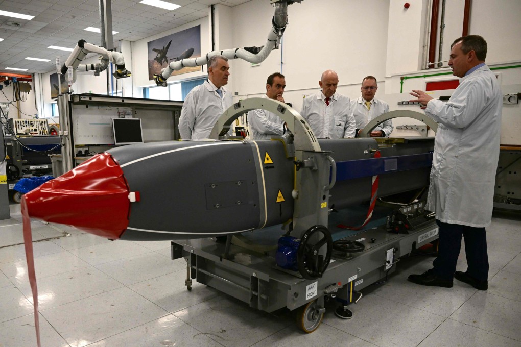 Britain’s Defence Secretary John Healey (centre) and his French counterpart Sebastien Lecornu (second left), are shown Storm Shadow missiles during a visit to MBDA missile factory in Stevenage, England, on Tuesday. Photo: AFP