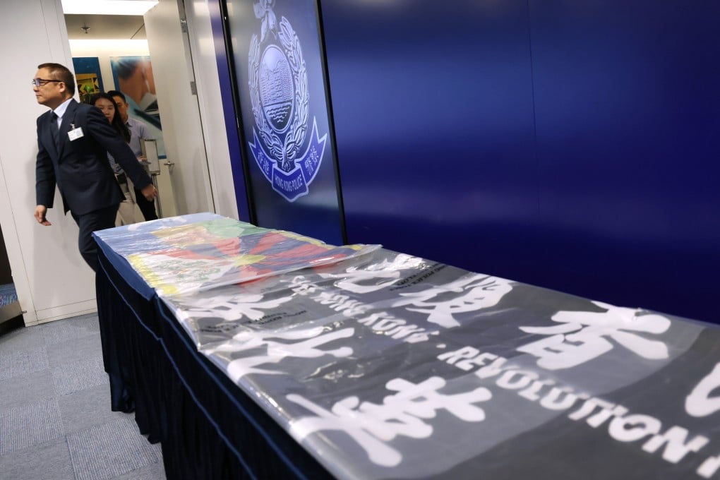 Police display seized flags advocating Hong Kong independence. Photo: Jelly Tse