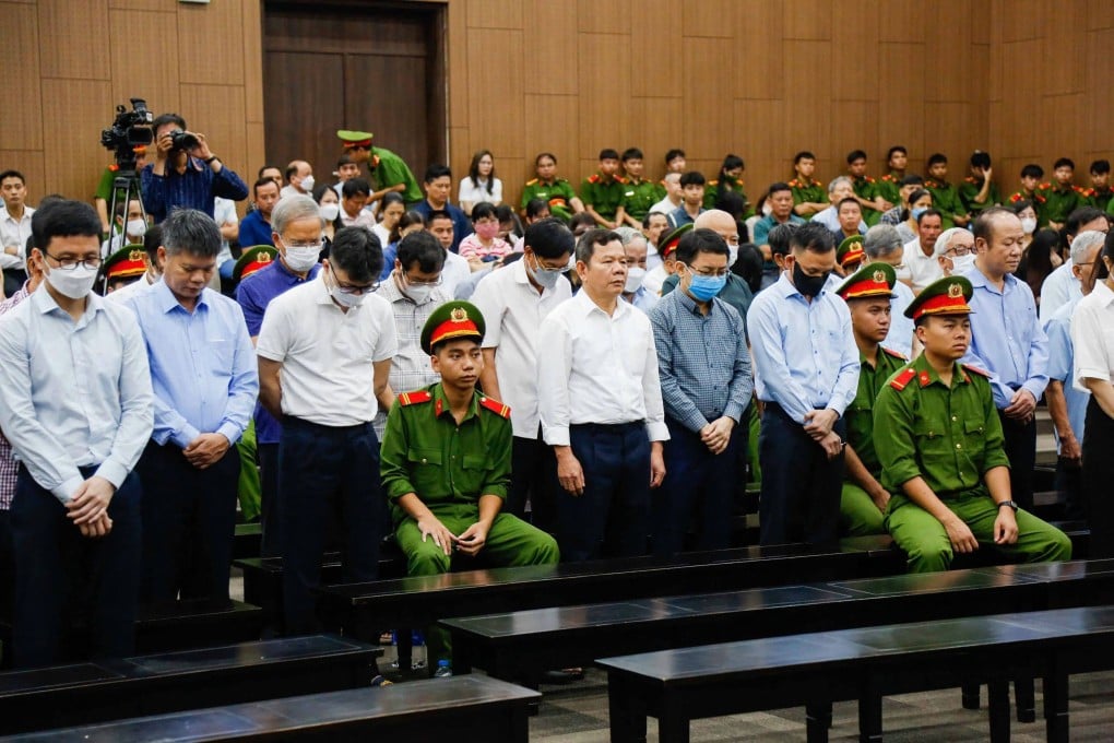 Defendants at their corruption trial in Hanoi on Friday. Photo: AFP