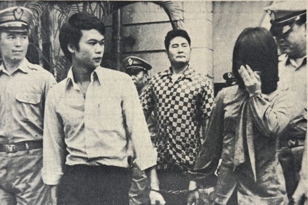 Alleged Hong Kong drug queen Yeung Yin-hing (right) is taken into Taipei District Court handcuffed to her bodyguard Chen Kwan-po to face narcotics trafficking charges. Photo: Photo: SCMP Archives