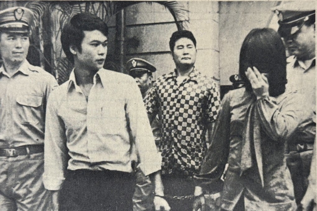 Alleged Hong Kong drug queen Yeung Yin-hing (right) is taken into Taipei District Court handcuffed to her bodyguard Chen Kwan-po to face narcotics trafficking charges. Photo: Photo: SCMP Archives