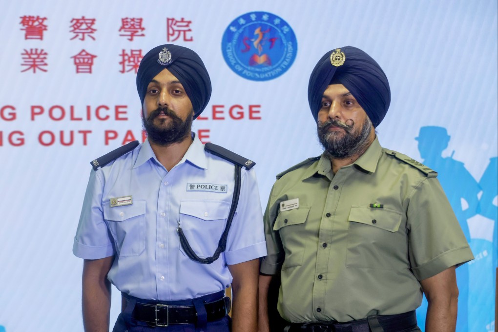 Police constable Palvinderjit Singh (left) and his father Davinder-pal Singh, an assistant officer with the Correctional Services Department, at Police College. Photo: Jonathan Wong