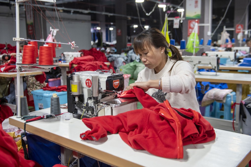 Workers make garments at a workshop in Qiandongnan, southwest China’s Guizhou province. China’s garment industry is rapidly losing market share in the United States amid the trade war. Photo: Getty Images