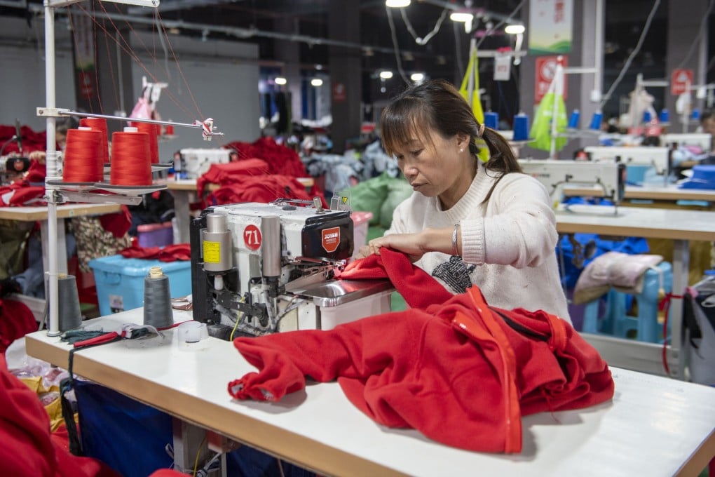 Workers make garments at a workshop in Qiandongnan, southwest China’s Guizhou province. China’s garment industry is rapidly losing market share in the United States amid the trade war. Photo: Getty Images