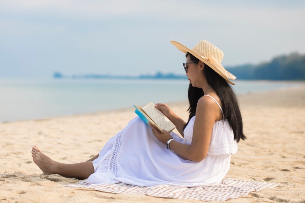 A woman relaxes on Khao Lak beach in Phuket. The digital nomad visa is proving to be a rare policy success for Thailand’s embattled government. Photo: Shutterstock
