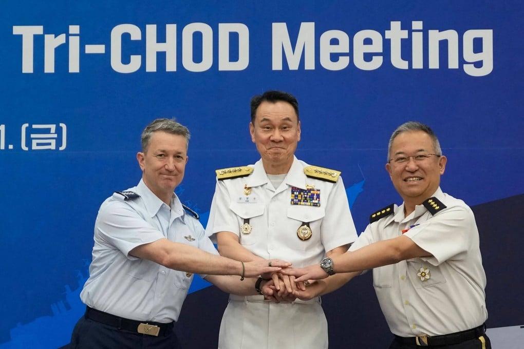 (From left) US Chairman of the Joint Chiefs of Staff Air Force General Dan Caine, Admiral Kim Myung-soo, chairman of South Korea’s Joint Chiefs of Staff, and General Yoshihide Yoshida, Chief of Staff, Joint Staff of Japan’s Self-Defence Forces, during the Trilateral Chiefs of Defence meeting in Seoul on Friday. Photo: Pool/AFP