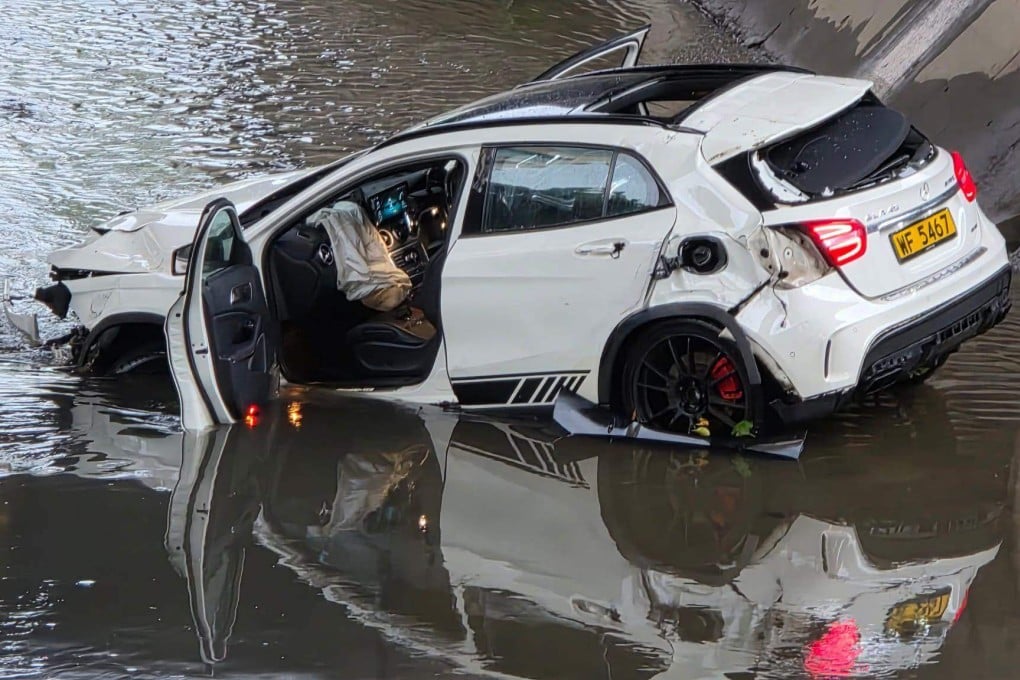 The Mercedes-Benz is sitting in a drainage channel in Yuen Long. Photo: Handout