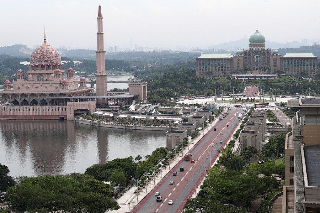Putra Mosque (left) and Malaysia’s Prime Minister Office in Putrajaya, Malaysia. About 63 per cent of the population in Malaysia is Muslim. Photo: Nora Tam